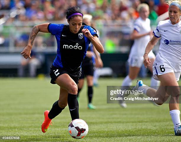 Sydney Leroux of Seattle Reign FC controls the ball against Jen Buczowski of FC Kansas City in the first half of the National Women's Soccer League...