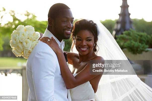 Dwyane Wade, wearing customized Dsquared2 Tuxedo, his personally designed Wedding Collection bowtie from The Tie Bar and a boutonniere by Floral Fix,...