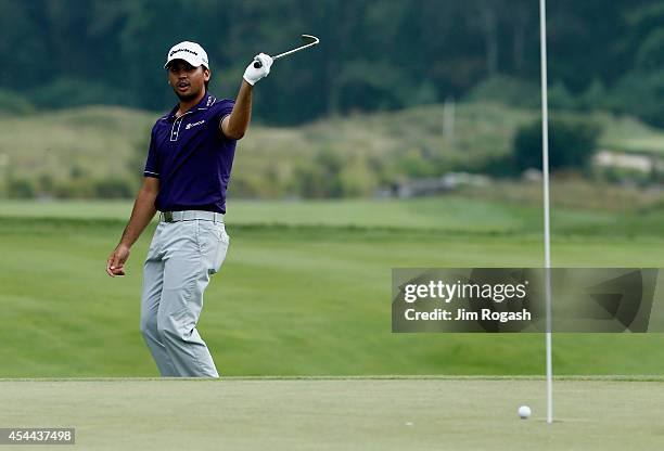 Jason Day of Australia reacts to missing a putt on the seventh hole during the third round of the Deutsche Bank Championship at the TPC Boston on...