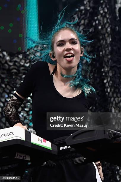 Claire Boucher of Grimes performs onstage at the 2014 Budweiser Made In America Festival at Benjamin Franklin Parkway on August 30, 2014 in...