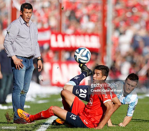 Ivan Pillud of Racing Club fights for the ball with Juan Lucero of Independiente during a match between Independiente and Racing as part of fifth...