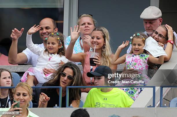 Myla Federer and Charlene Federer, Roger Federer's twins cheer for their during his match on Day 7 of the 2014 US Open at USTA Billie Jean King...