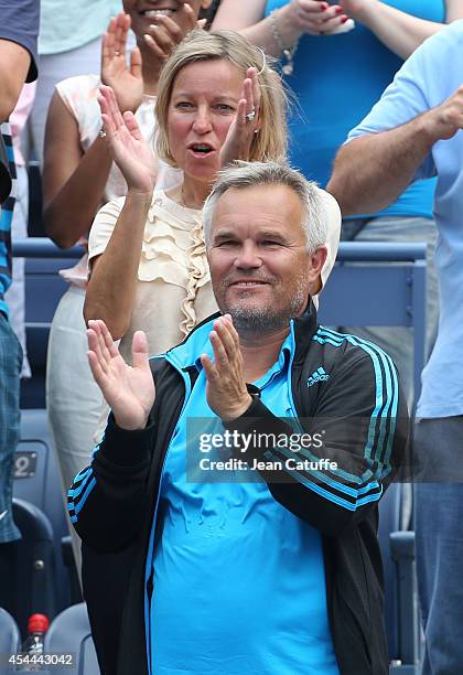 Piotr Wozniacki, father and coach of Caroline Wozniacki of Denmark, and Anna Wozniacki, her mother celebrate her victory on Day 7 of the 2014 US Open...