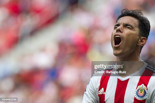 Omar Bravo of Chivas reacts after missing a chance to score during a match between Chivas and Cruz Azul a as part of Apertura 2014 Liga MX at...