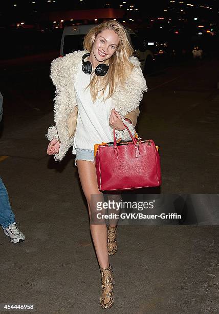 Candice Swanepoel is seen at Los Angeles International Airport on March 29, 2012 in Los Angeles, California.