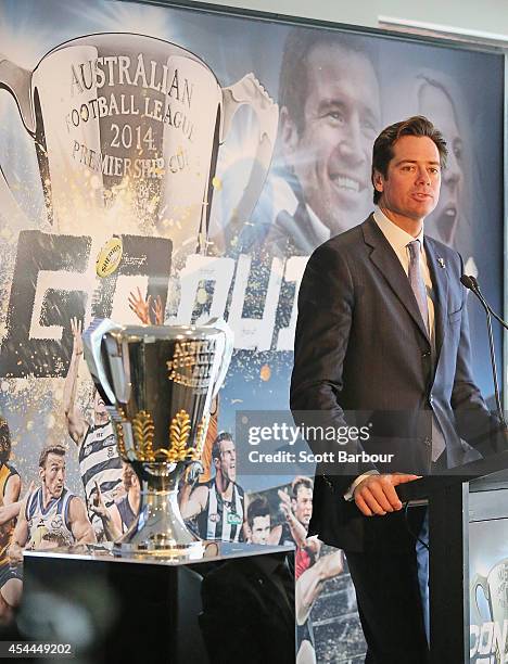 Gillon McLachlan speaks next to the 2014 AFL Premiership Cup during the AFL Premiership Cup handover on September 1, 2014 in Melbourne, Australia.