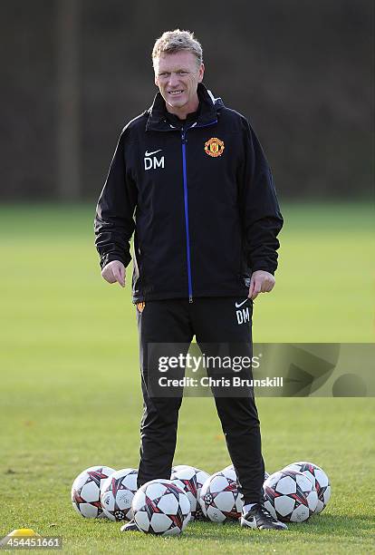 Manchester United manager David Moyes looks on during a first team training session, ahead of their UEFA Champions League Group A match against...