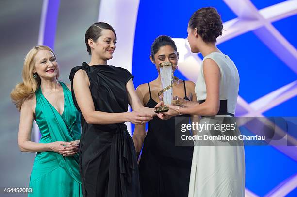 Patricia Clarkson, Golsshifteh Farhani and Marion Cotillard award Alica Vikander best actress during the Award Ceremony of the 13th Marrakech...
