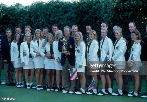 The United States team with their wives and partners and the trophy after the United States team wins the Ryder Cup golf competition held at the...
