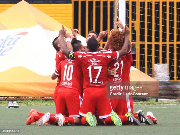 Players of America de Cali celebrate a scored goal by Stiven Tapiero during a match between America de Cali and Bucaramanga as part of Torneo...