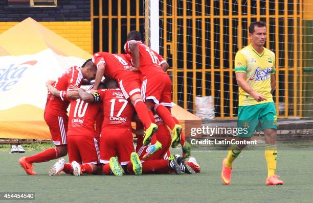 Players of America de Cali celebrate a scored goal by Stiven Tapiero during a match between America de Cali and Bucaramanga as part of Torneo...