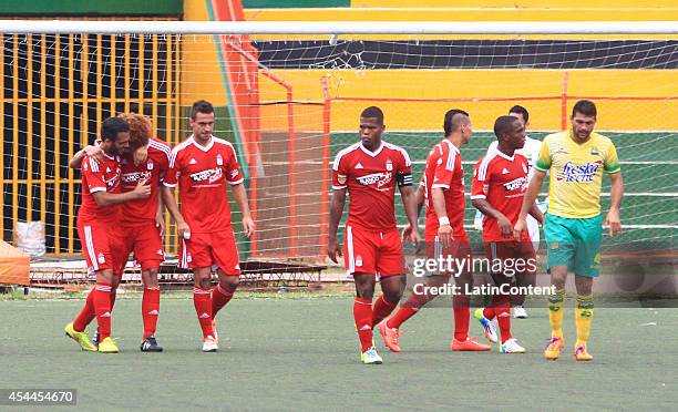 Players of America de Cali celebrate a scored goal by Stiven Tapiero during a match between America de Cali and Bucaramanga as part of Torneo...