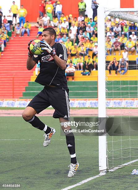 Jhon Meneses goalkeeper of America de Cali catches the ball during a match between America de Cali and Bucaramanga as part of Torneo Postobon 2014 -...