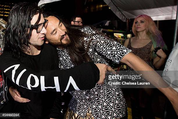 DJs Skrillex and Steve Aoki backstage during day 2 of the Made in America Festival at Los Angeles Grand Park on August 31, 2014 in Los Angeles,...