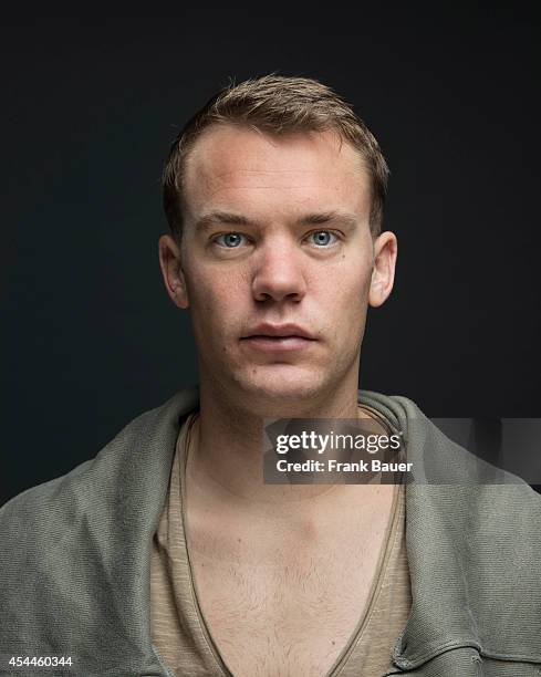 Footballer Manuel Neuer is photographed for Db Mobil magazine in Munich, Germany on March 12, 2014.