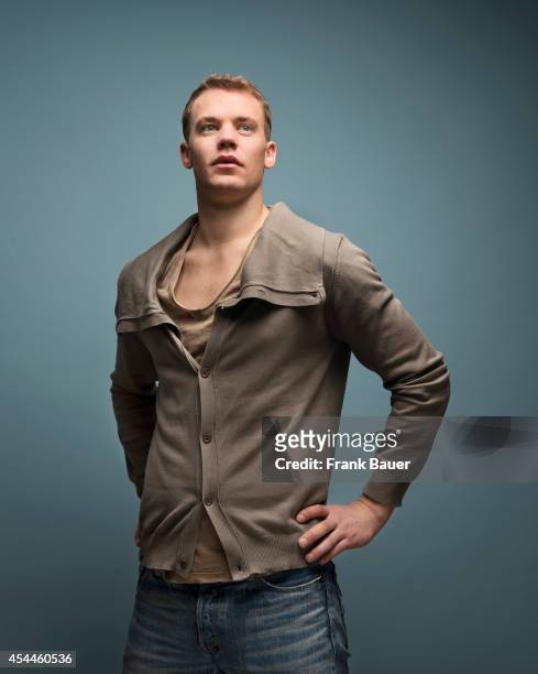 Footballer Manuel Neuer is photographed for Db Mobil magazine in Munich, Germany on March 12, 2014.