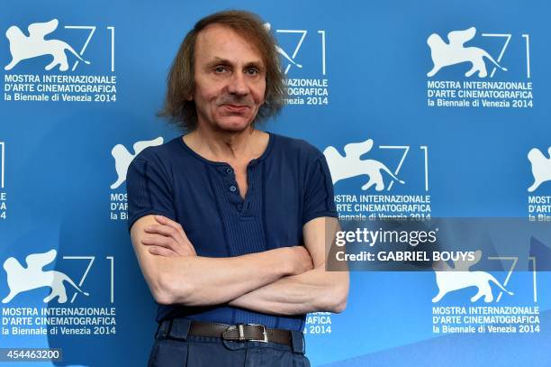 French writer Michel Houellebecq poses during the photocall of the movie "Near Death Experience" presented in the Orizzonti selection at the 71st...