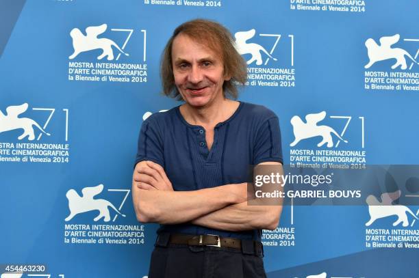 French writer Michel Houellebecq poses during the photocall of the movie "Near Death Experience" presented in the Orizzonti selection at the 71st...