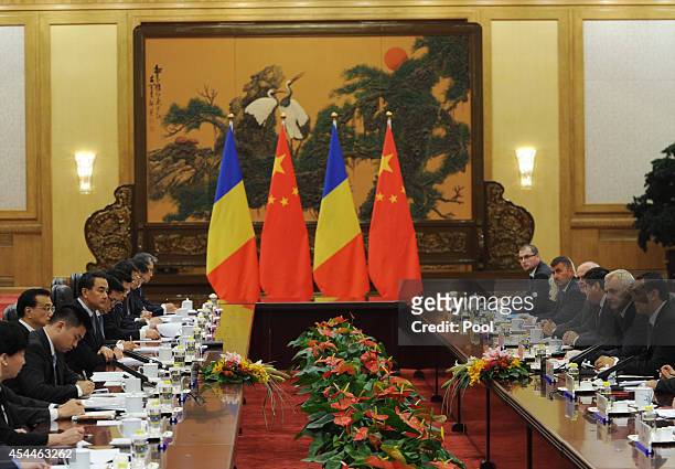 Chinese Premier Li Keqiang attends a meeting with Romanian Prime Minister Victor Ponta at the Great Hall of the People on September 1, 2014 in...