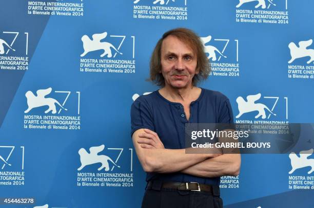 French writer Michel Houellebecq poses during the photocall of the movie "Near Death Experience" presented in the Orizzonti selection at the 71st...