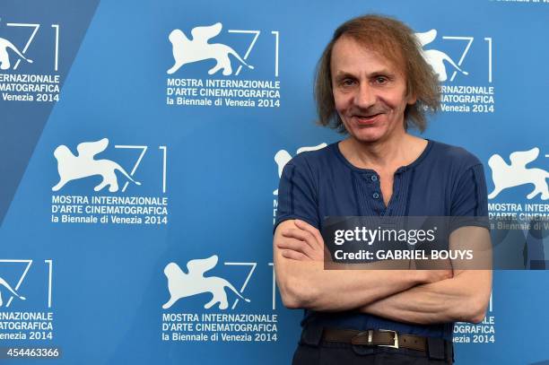 French writer Michel Houellebecq poses during the photocall of the movie "Near Death Experience" presented in the Orizzonti selection at the 71st...