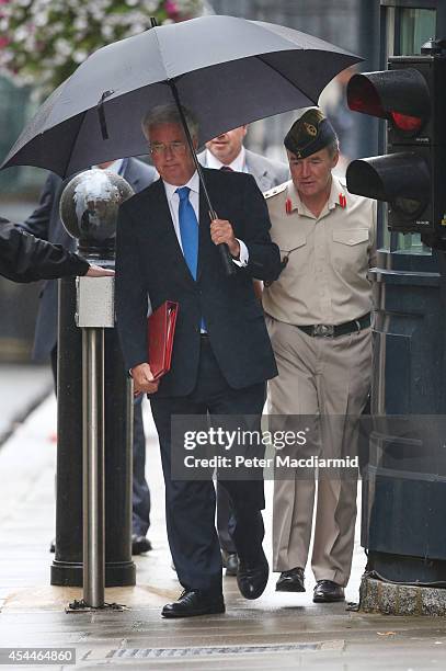 Secretary of Defence Michael Fallon walks into Downing Street with Chief of the Defence Staff General Sir Nicholas Houghton on September 1, 2014 in...