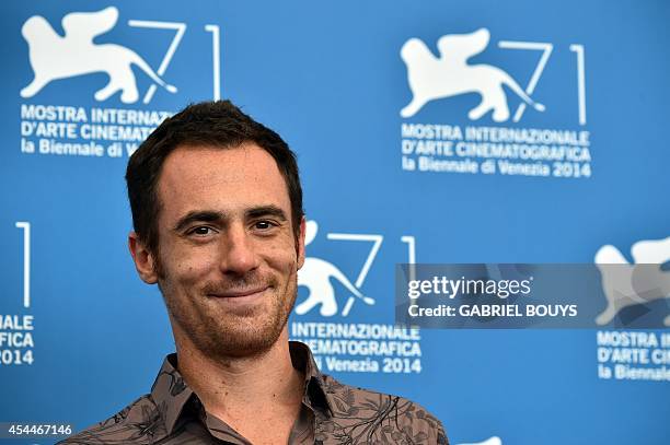 Italian actor Elio Germano poses during the photocall of the movie "Il Giovane Favoloso" presented in competition at the 71st Venice Film Festival on...