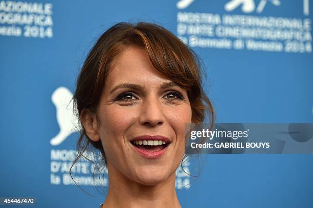 Italian actress Isabella Ragonese poses during the photocall of the movie "Il Giovane Favoloso" presented in competition at the 71st Venice Film...