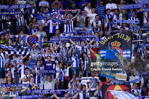 Espanyol fans cheer on their team during the La Liga Match between RCD Espanyol and Sevilla FC at Cornella-El Prat Stadium on August 30, 2014 in...