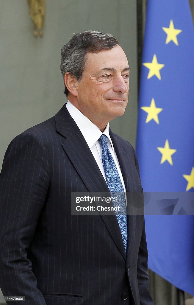 French President Francois Hollande Receives ECB President Mario Draghi