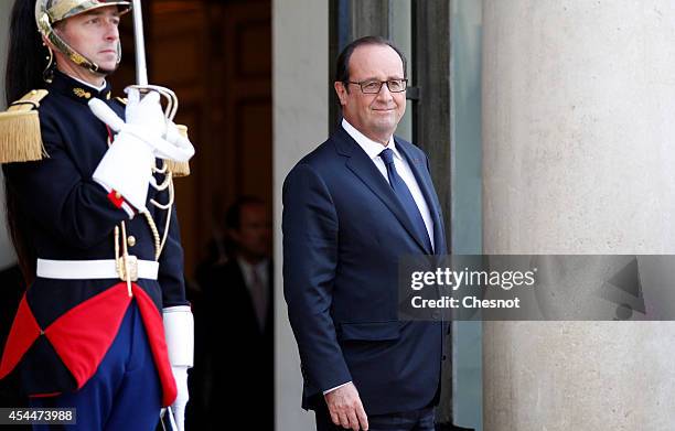 French President Francois Hollande waits before his meeting with Saudi Crown Prince Salman Bin Abdulaziz Al-Saud at the Elysee Presidentiel Palace on...