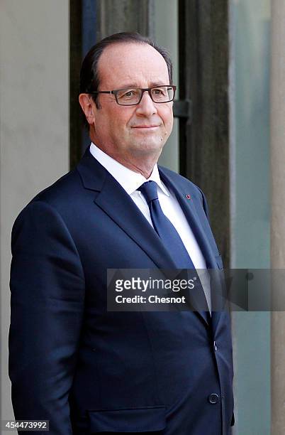 French President Francois Hollande waits before his meeting with Saudi Crown Prince Salman Bin Abdulaziz Al-Saud at the Elysee Presidentiel Palace on...