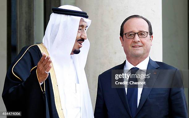 French President Francois Hollande welcomes Saudi Crown Prince Salman Bin Abdulaziz Al-Saud prior their meeting at the Elysee Presidential Palace on...