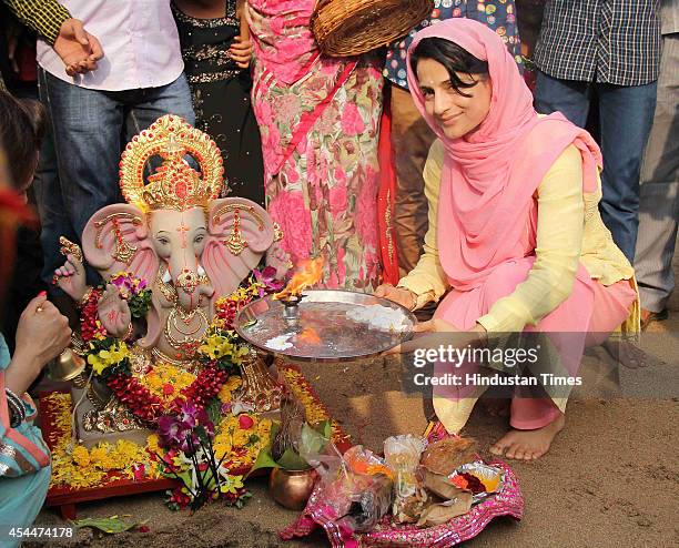 Bollywood actor Ameesha Patel at her Ganesh Idol immersion procession on August 30, 2014 in Mumbai, India.