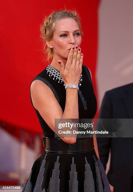 ItalyY Uma Thurman blows a kiss to the crowd at the 'Nymphomaniac: Volume 2 - Directors Cut' Premiere during the 71st Venice Film Festival on...