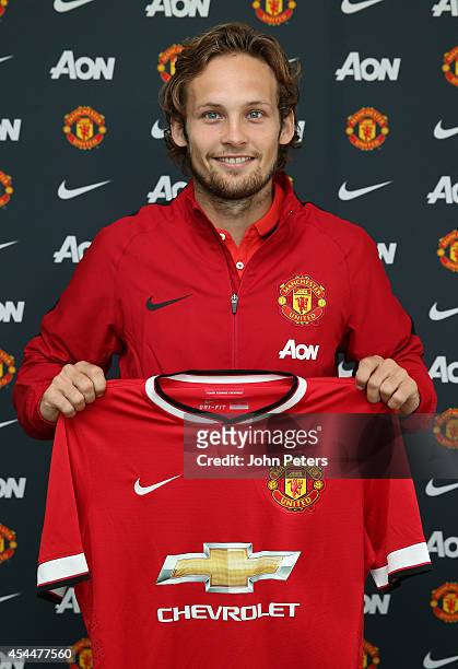 Daley Blind of Manchester United poses after signing for the club at Aon Training Complex on August 31, 2014 in Manchester, England.