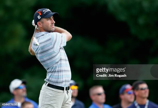 Geoff Ogilvy of Australia tees off on the third hole during the final round of the Deutsche Bank Championship at the TPC Boston on September 1, 2014...