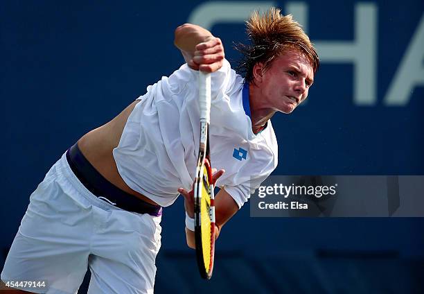 Alexander Bublik of Russia plays against Naoki Nakagawa of Japan in their junior boys' first round match on Day Eight of the 2014 US Open at the USTA...