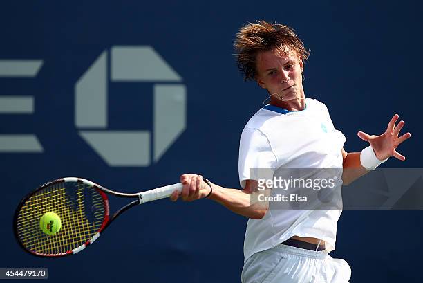 Alexander Bublik of Russia plays against Naoki Nakagawa of Japan in their junior boys' first round match on Day Eight of the 2014 US Open at the USTA...