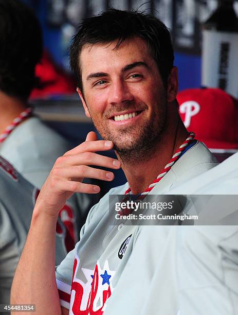 Cole Hamels of the Philadelphia Phillies relaxes in the dugout during the eighth inning of a four pitcher no-hitter against the Atlanta Braves at...