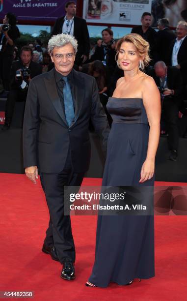 Director Mario Martone and wife Ippolita di Majo attend the 'Il Giovane Favoloso' premiere during the 71st Venice Film Festival at Sala Grande on...