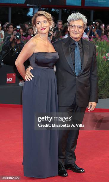 Director Mario Martone and wife Ippolita di Majo attend the 'Il Giovane Favoloso' premiere during the 71st Venice Film Festival at Sala Grande on...