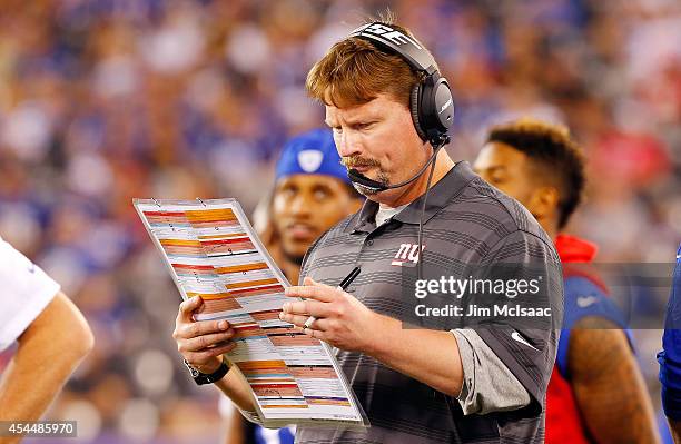 Offensive coordinator Ben McAdoo of the New York Giants in action against the New England Patriots on August 28, 2014 at MetLife Stadium in East...