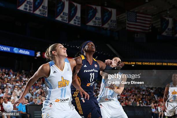 Elena Delle Donne and Allie Quigley of the Chicago Sky battle for position against Lynetta Kizer of the Indiana Fever during game two of the WNBA...