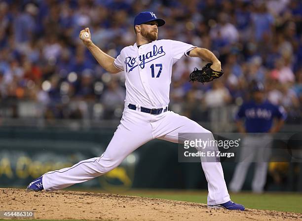 Wade Davis of the Kansas City Royals throws in the eighth inning against the Texas Rangers at Kauffman Stadium on September 1, 2014 in Kansas City,...
