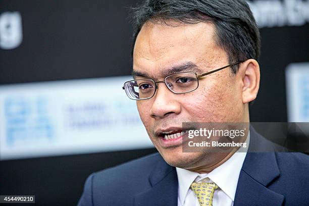 Muzaffar Hisham, chief executive officer of Maybank Islamic Bhd., speaks during a Bloomberg Television interview at the Global Islamic Finance Forum...