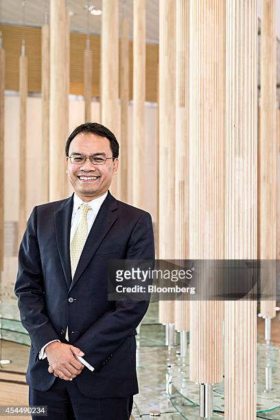 Muzaffar Hisham, chief executive officer of Maybank Islamic Bhd., stands for a photograph after a Bloomberg Television interview at the Global...