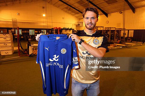 New signing Nick Powell of Leicester City FC poses with his shirt on a season long loan from Manchester United on September 1, 2014 in Leicester,...