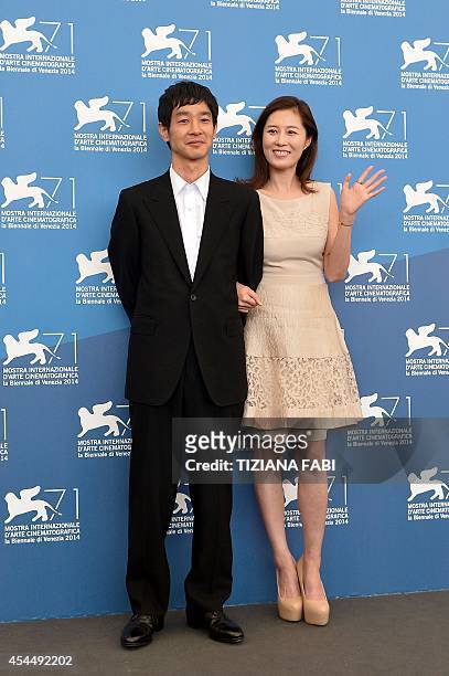 Japanese actor Ryo Kase and South Korean actress Moon So-ri pose during the photocall of the movie "Jayueui Onduk" presented in the Orizzonti...
