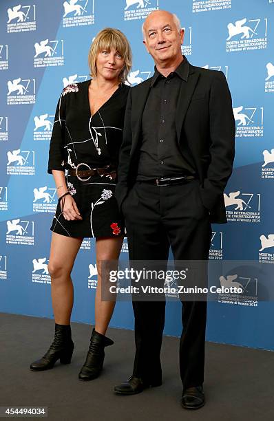 Editor Cristina Sardo and director Davide Ferrario attends the 'La Zuppa Del Demonio' - Photocall during the 71st Venice Film Festival on September...